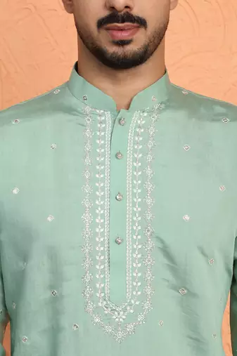 Cotton silk yoke design embroidered green kurta with trouser pant