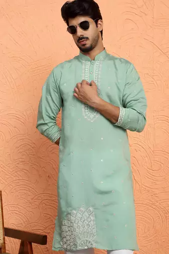 Cotton silk yoke design embroidered green kurta with trouser pant