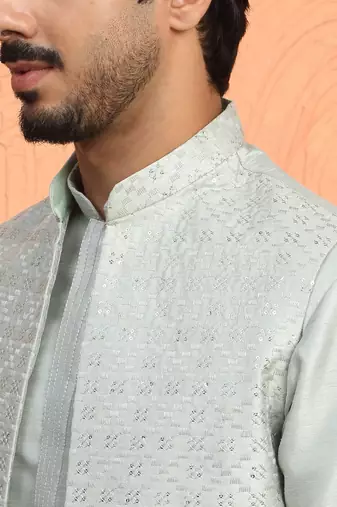 Silk blend green kurta and trouser with long embroidered sequin nehru jacket