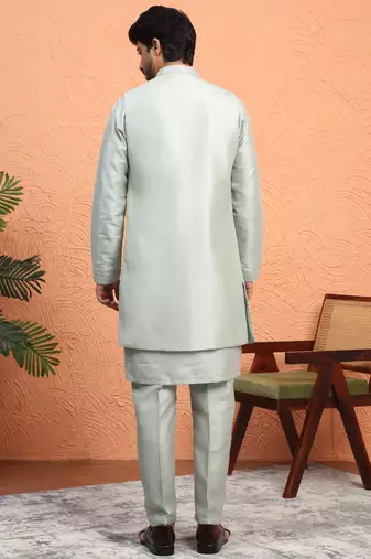 Silk blend green kurta and trouser with long embroidered sequin nehru jacket