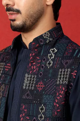 Silk blend blue kurta and trouser with embroidered nehru jacket