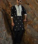 Cotton silk embroidered yoke design black kurta with trouser pant