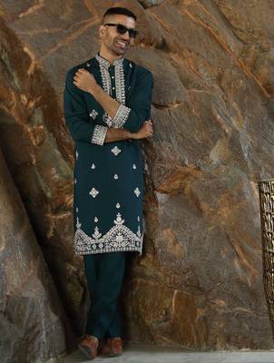 Cotton silk embroidered yoke design green kurta with trouser pant 1