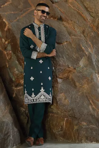 Cotton silk embroidered yoke design green kurta with trouser pant