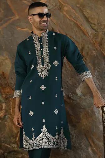 Cotton silk embroidered yoke design green kurta with trouser pant