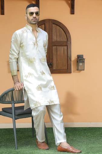 Cotton silk ethnic motifs embroidered cream kurta with trouser pant