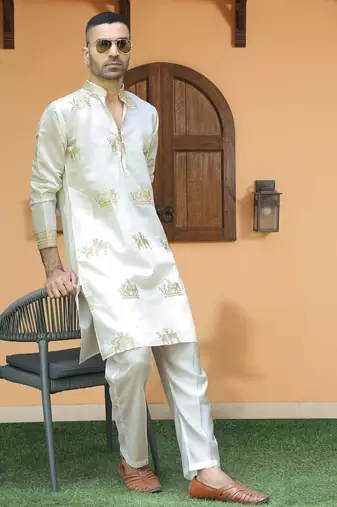 Cotton silk ethnic motifs embroidered cream kurta with trouser pant