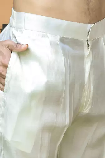 Cotton silk ethnic motifs embroidered cream kurta with trouser pant