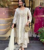 Off white art silk embroidered salwar suit