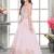 Peach shimmer tissue embriodered blouse and flared lehenga with dupatta