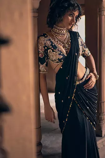 Black hand embroidered crepe saree with belt