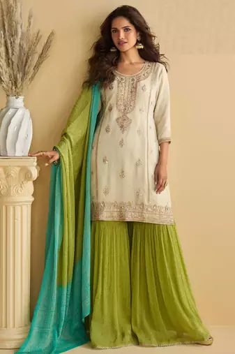 Off white zari embroidery , sequins , beads & printed chinnon straight sharara suit- free size stitched(size upto 42")