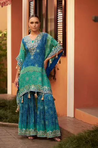 Turquoise & blue chinnon kaftan suit with embroidery, sequins, mirror, gota & tassel work, free size up to 42"