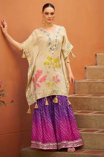Cream chinnon  kaftan  suit with embroidery, sequins, mirror, gota & tassel work, free size stitched up to 42"