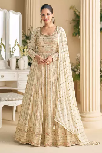 Beige georgette anarkali gown palazzo suit with seroski zarkan, embroidery, beads & sequins, free size up to 42"