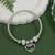 Adjustable heart charm design snake bracelet with family motif in silver tone for women (adb567)