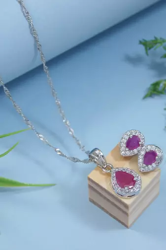 Latest stylish silver plated cz american diamond teardrop pendant necklace & earrings set for women 