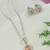 Latest stylish silver plated cz american diamond teardrop pendant necklace & earrings set for women (silver gold)