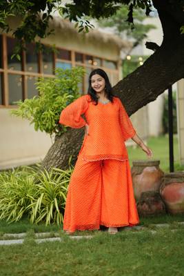 Orange leheriya embroidered kurta with palazo 1