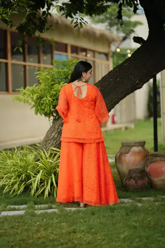 Orange leheriya embroidered kurta with palazo