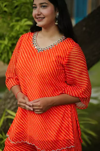 Orange leheriya embroidered kurta with palazo