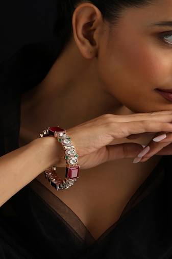 Gold plated kundan red stones bangle