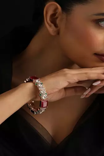 Gold plated kundan red stones bangle