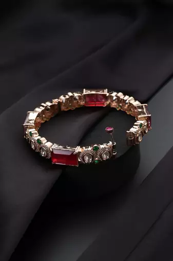 Gold plated kundan red stones bangle