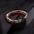 Gold plated kundan red stones bangle