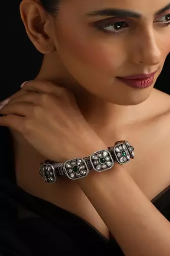 Gold plated Kundan Green Stones bangle