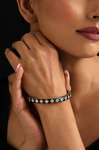 Gold plated kundan green enamel bangle