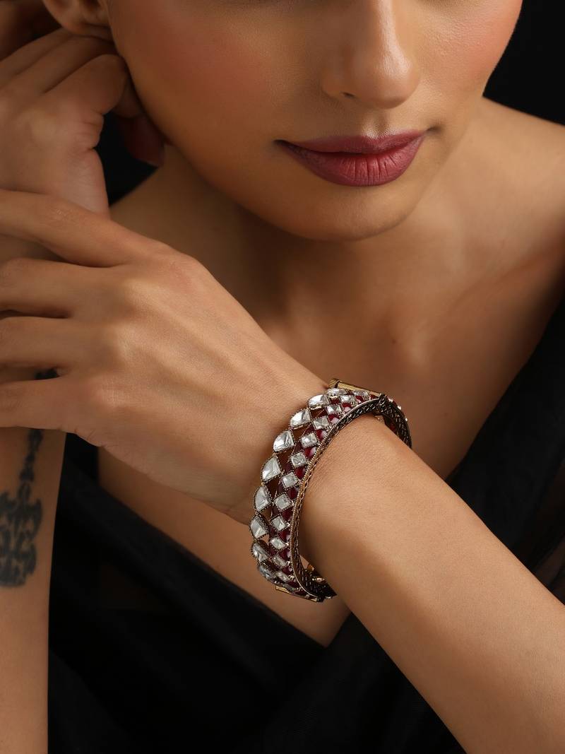 Gold plated kundan red stones bangle