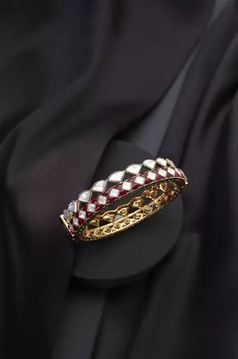 Gold plated kundan red stones bangle
