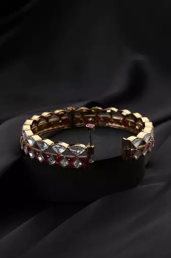 Gold plated kundan red stones bangle