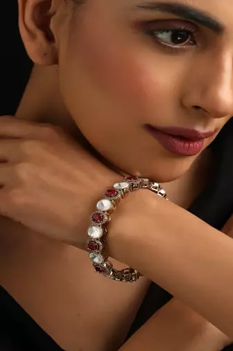 Gold plated kundan red stones bangle