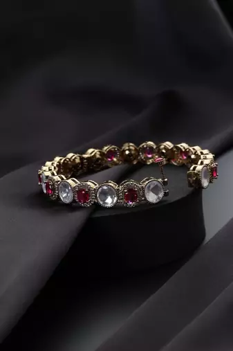 Gold plated kundan red stones bangle
