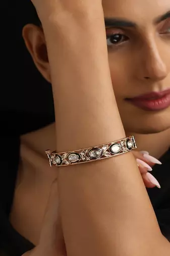 Gold plated kundan green enamel bangle