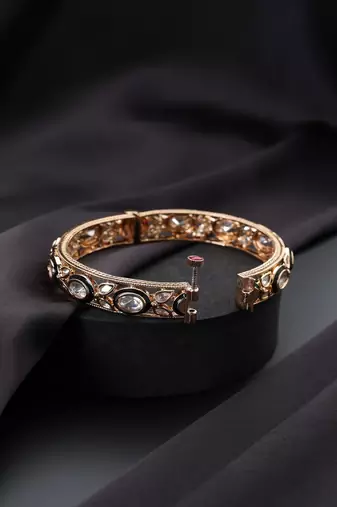 Gold plated kundan green enamel bangle