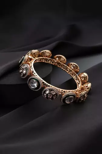Gold plated kundan green enamel bangle