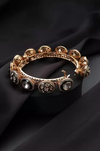 Gold plated kundan green enamel bangle