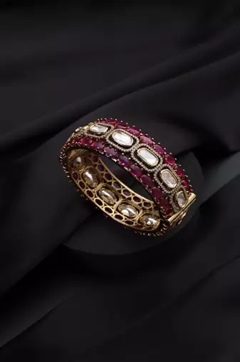 Gold plated kundan red stones bangle