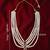 Vastramay men's white & maroon tasselled pearl wedding necklace