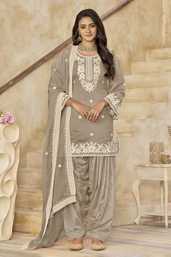 Dusty beige embroidered roman silk patiala suits