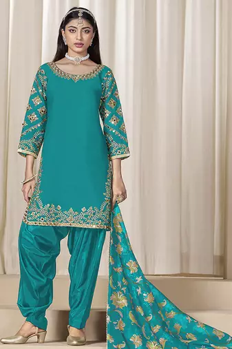 Teal blue embroidered  roman silk patiala suits
