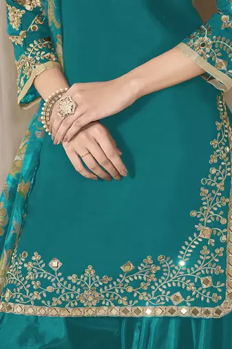 Teal blue embroidered  roman silk patiala suits
