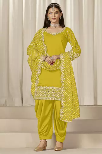 Yellow embroidered roman silk patiala suits