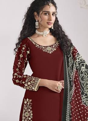 Maroon embroidered & mirror roman silk patiala suits 3
