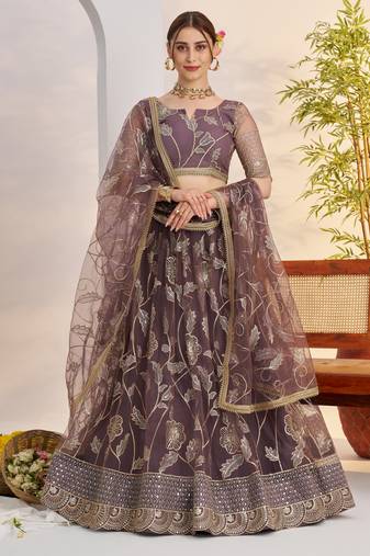 Darkonion Net With embroidered party wear lehenga choli