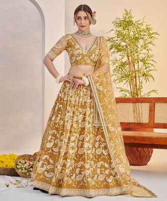 light golden Net With embroidered party wear lehenga choli 2