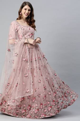 Enchanting light pink embroidered net wedding lehenga choli with dupatta